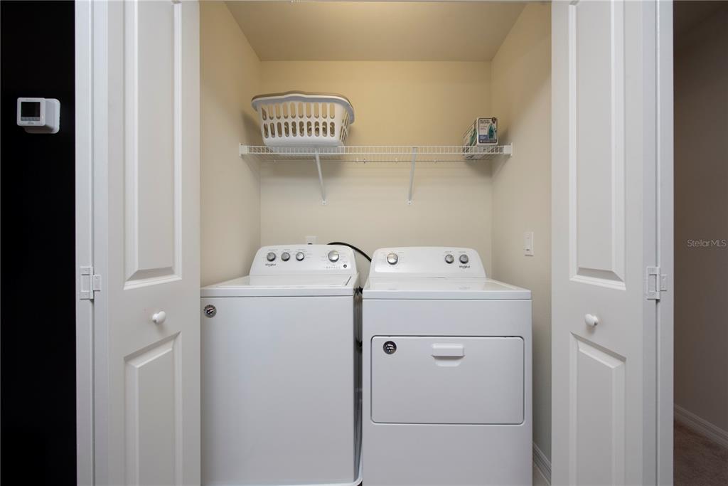126 Jetty Way Davenport, FL 33897 - Photo 39 of 52 a utility room with dryer and washer