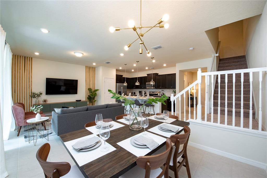 126 Jetty Way Davenport, FL 33897 - Photo 4 of 52 a view of a dining room with furniture