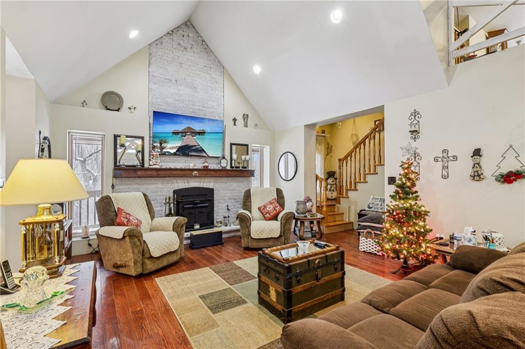 199 Anglers Rest Lane Utica, PA 16362 - Photo 11 of 49 a living room with furniture and a fireplace