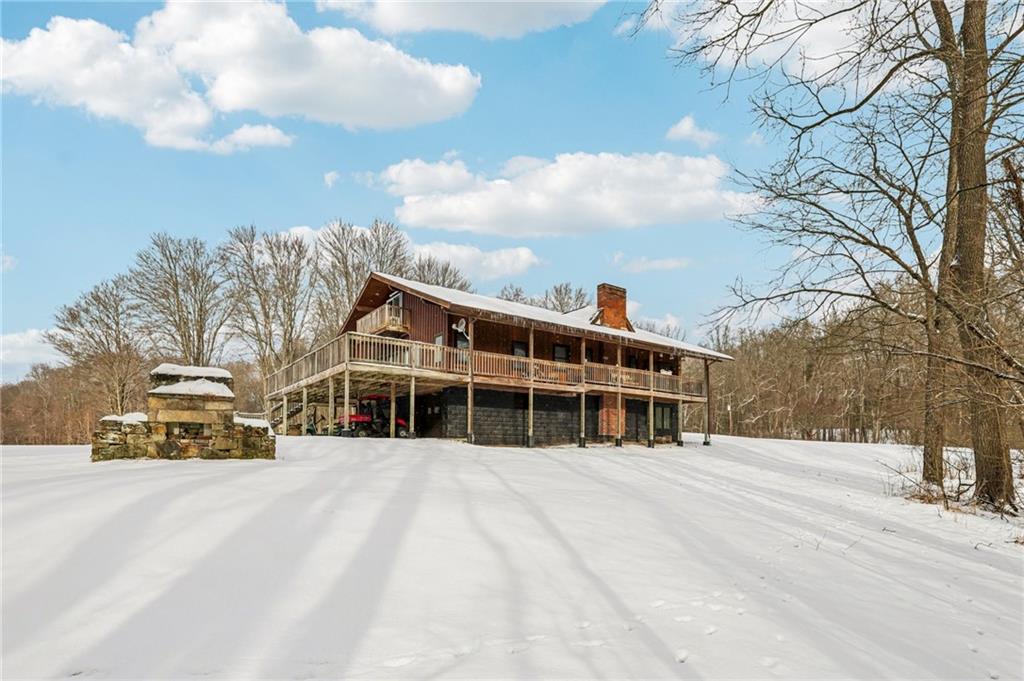 199 Anglers Rest Lane Utica, PA 16362 - Photo 2 of 49 a view of building with large trees