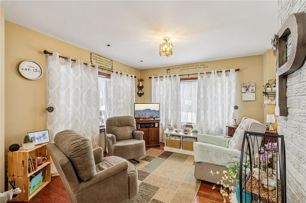 199 Anglers Rest Lane Utica, PA 16362 - Photo 8 of 49 a living room with furniture and a large window