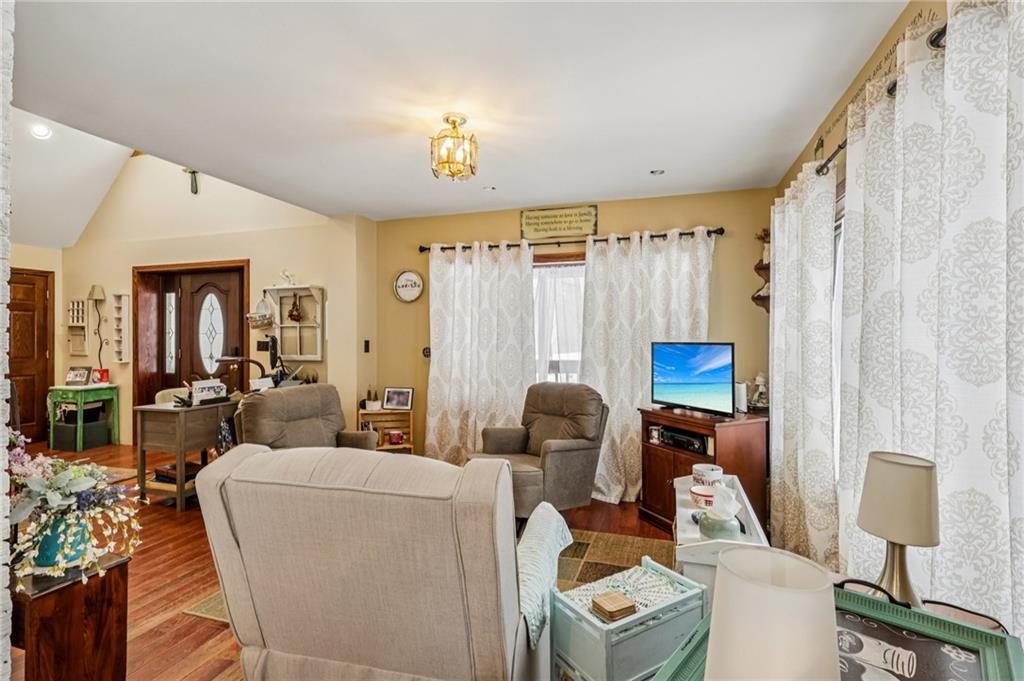 199 Anglers Rest Lane Utica, PA 16362 - Photo 9 of 49 a living room with furniture and a lamp