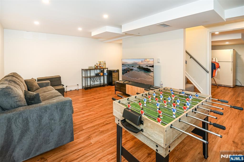 260 Kensington Road River Edge, NJ 07661 - Photo 18 of 22 a living room with furniture and wooden floor