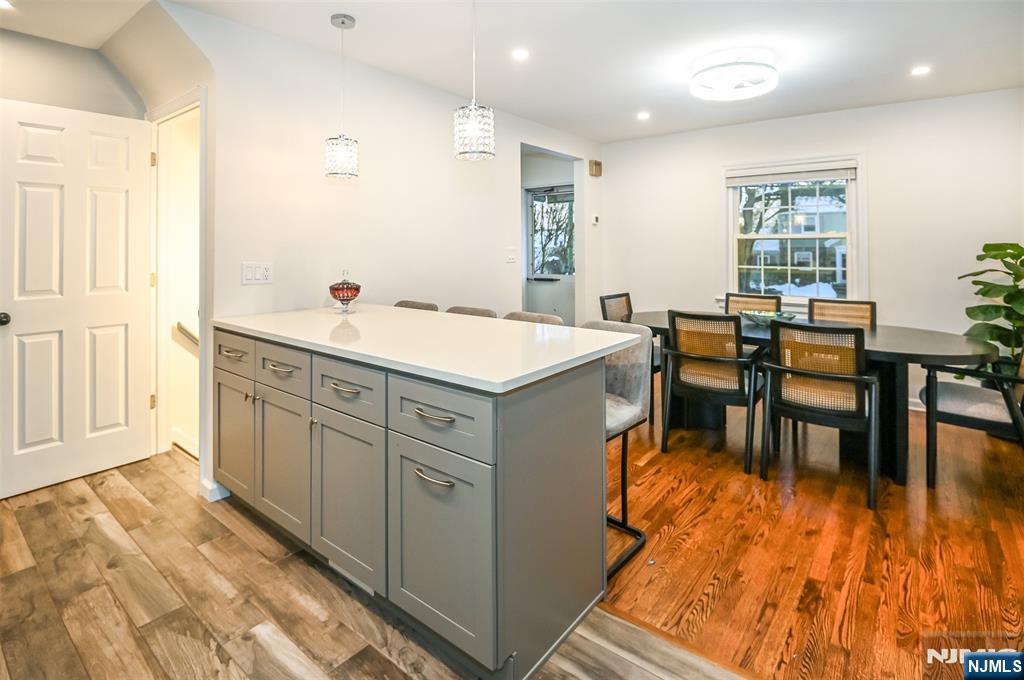 260 Kensington Road River Edge, NJ 07661 - Photo 4 of 22 a kitchen with stainless steel appliances granite countertop a sink and a stove