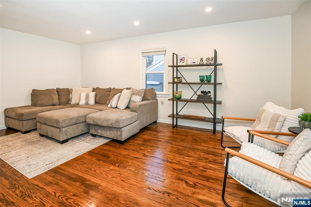 260 Kensington Road River Edge, NJ 07661 - Photo 7 of 22 a living room with furniture and a wooden floor