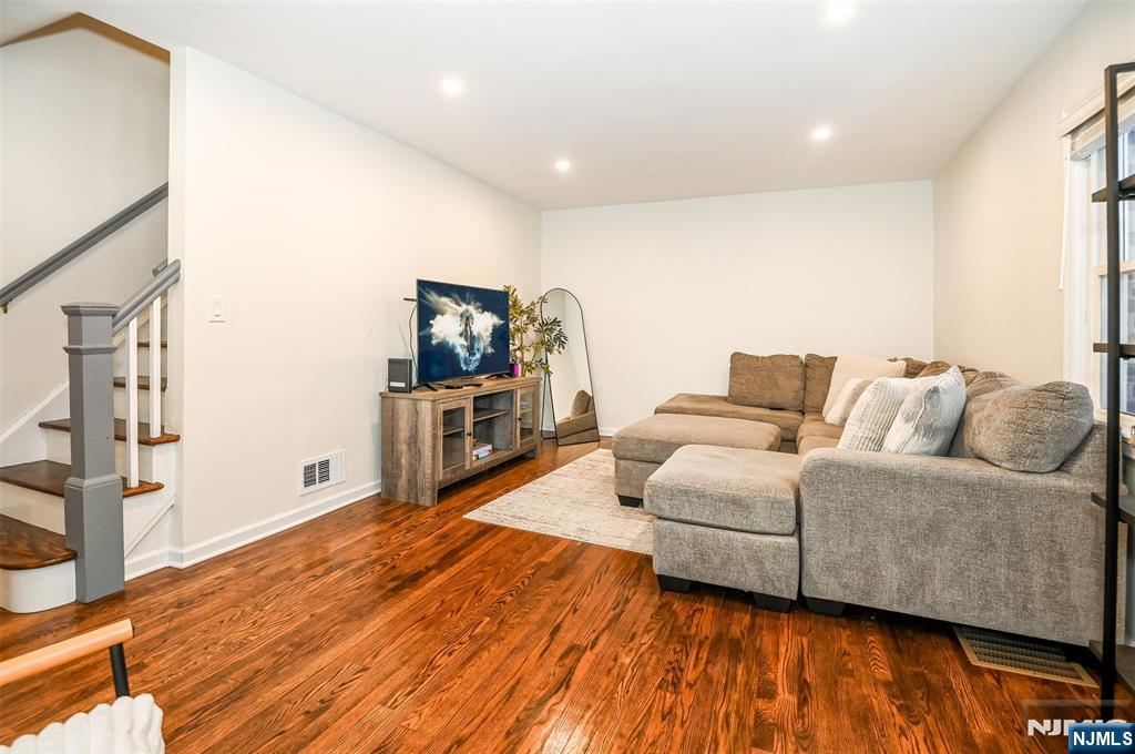 260 Kensington Road River Edge, NJ 07661 - Photo 9 of 22 a living room with furniture and a flat screen tv