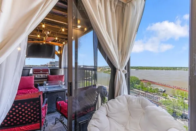 a view of balcony with furniture