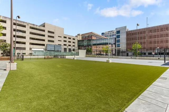 a view of a swimming pool with chairs