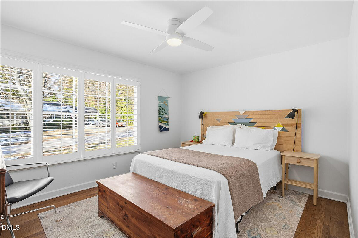 5904 Volant Drive Raleigh, NC 27609 - Photo 27 of 42 a bedroom with a bed and window