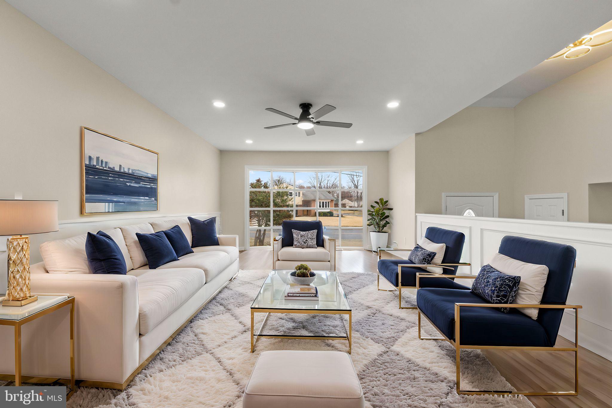 998 Kingston Drive Cherry Hill, NJ 08034 - Photo 13 of 35 a living room with furniture fireplace and a large window