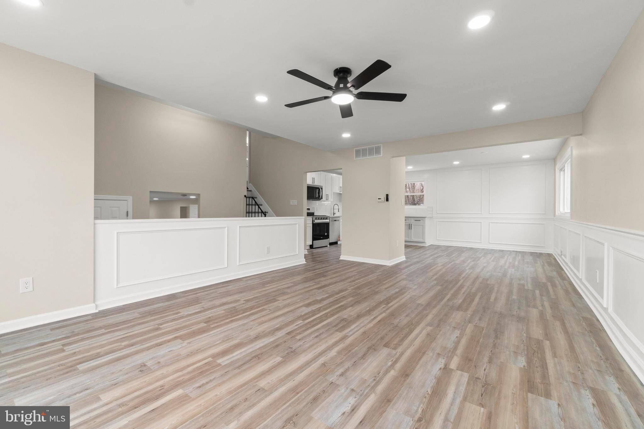998 Kingston Drive Cherry Hill, NJ 08034 - Photo 31 of 35 a view of a kitchen with a sink and wooden floor