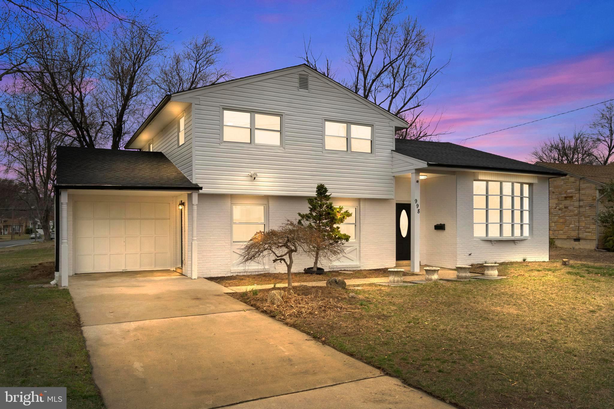 998 Kingston Drive Cherry Hill, NJ 08034 - Photo 2 of 35 a front view of a house with a yard