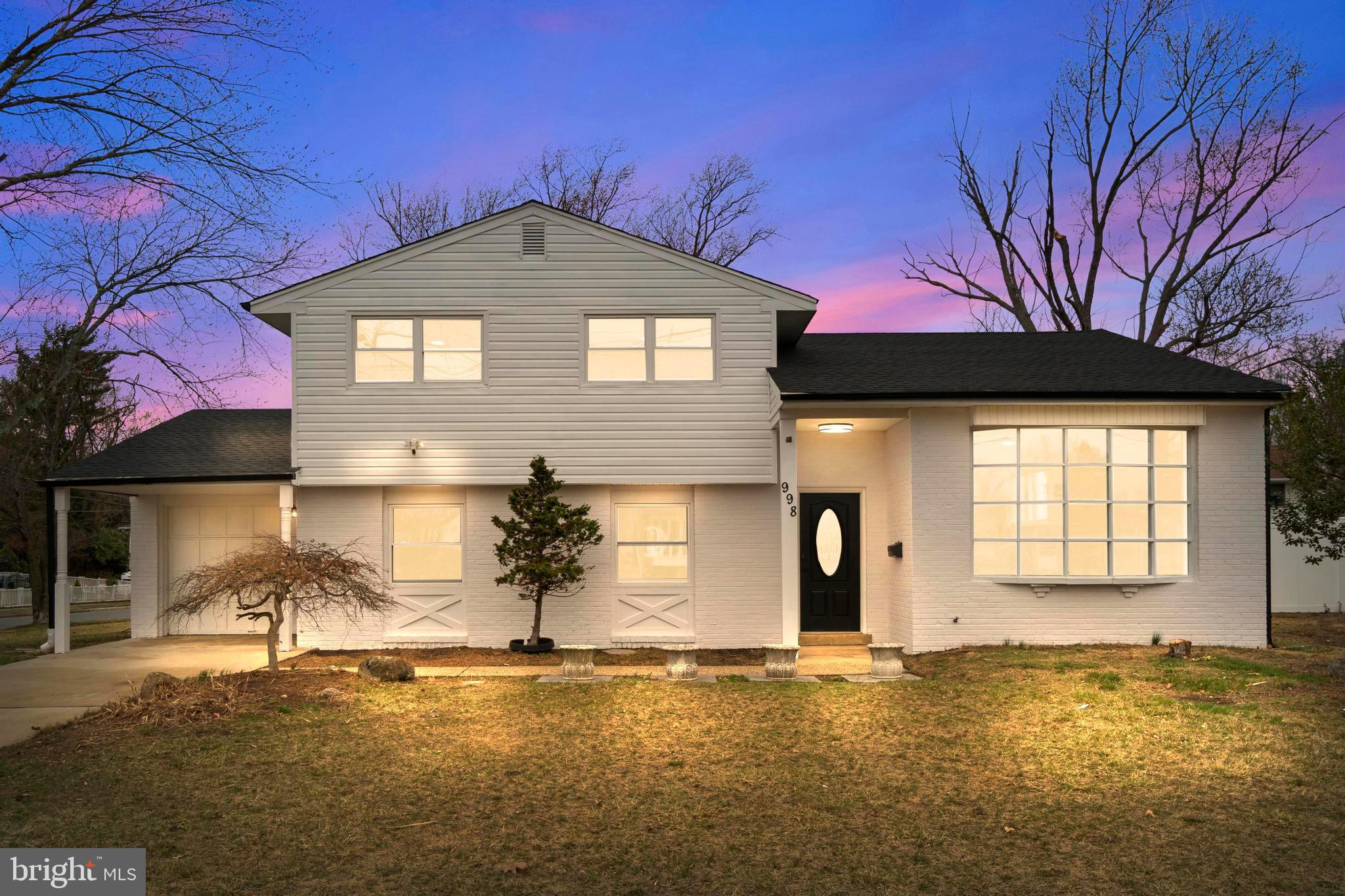 998 Kingston Drive Cherry Hill, NJ 08034 - Photo 3 of 35 a front view of a house with a yard