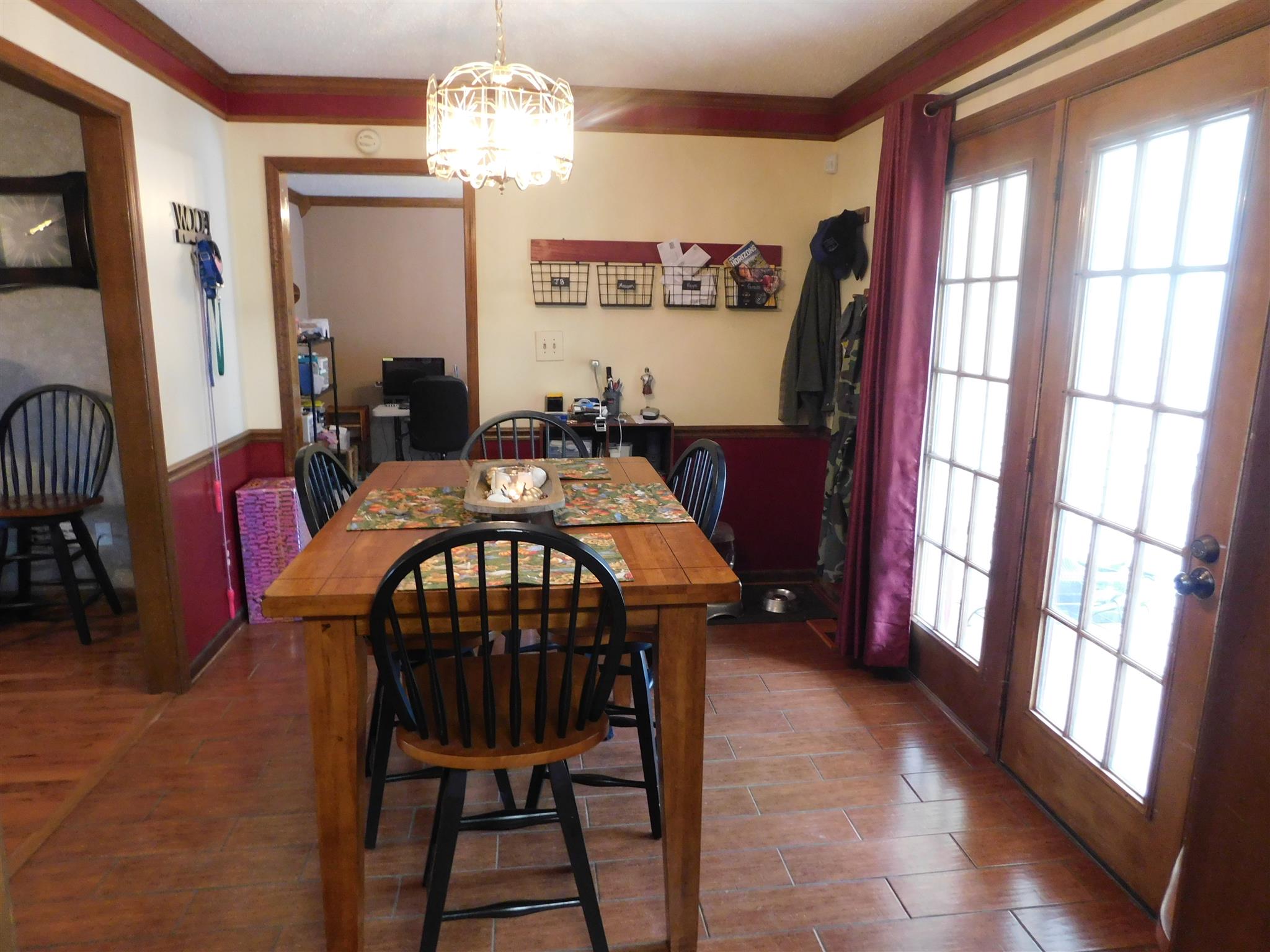 2495 Zion Road Columbia, TN 38401 - Photo 7 of 16 Dining Room has hardwood floors and doors that lead to the covered patio.
