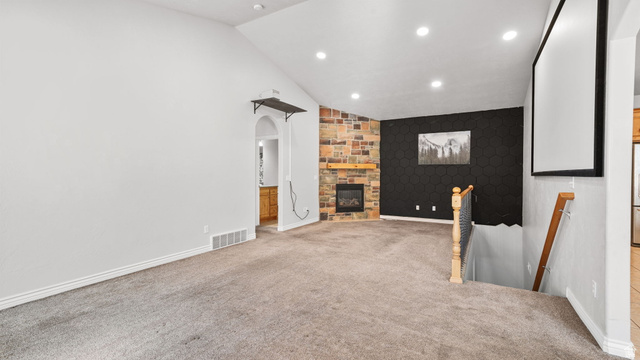 45 North 970 W Street Orem, UT 84057 - Photo 5 of 45 Living room with large projector screen and gas fireplace