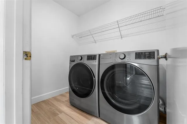 a utility room with dryer and washer