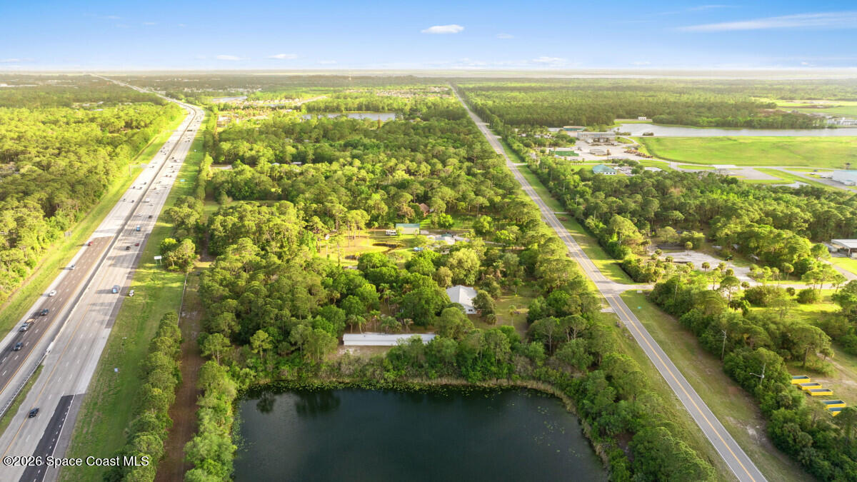2493 Adamson Road Cocoa, FL 32926 - Photo 44 of 46 a view of an outdoor space and a lake view