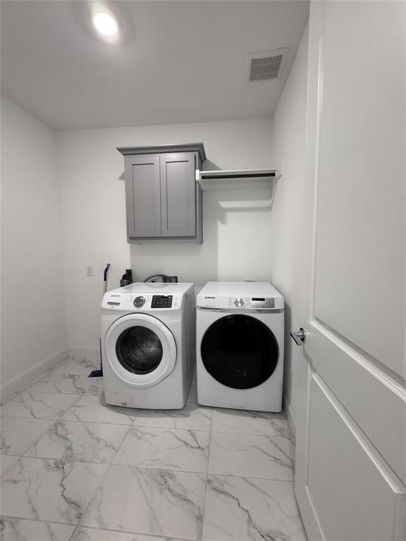 17305 Texas Pistache Drive Dallas, TX 75252 - Photo 5 of 13 a utility room with dryer and washer