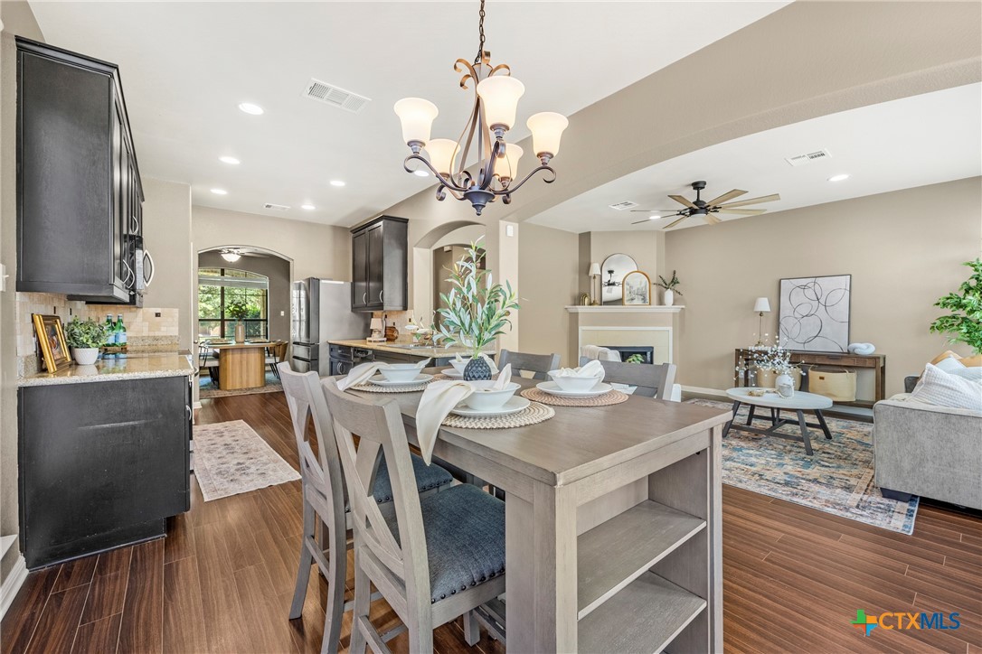3306 Castleton Drive Killeen, TX 76542 - Photo 14 of 39 a view of a dining room with furniture and wooden floor