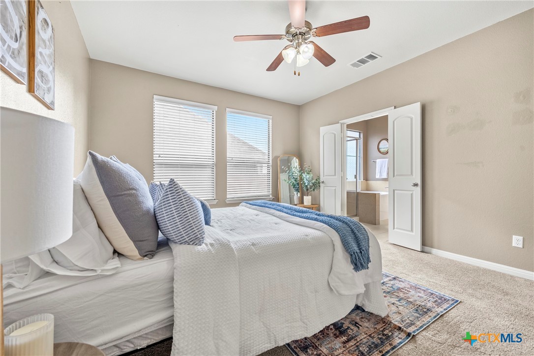 3306 Castleton Drive Killeen, TX 76542 - Photo 15 of 39 a bedroom with a bed and dresser