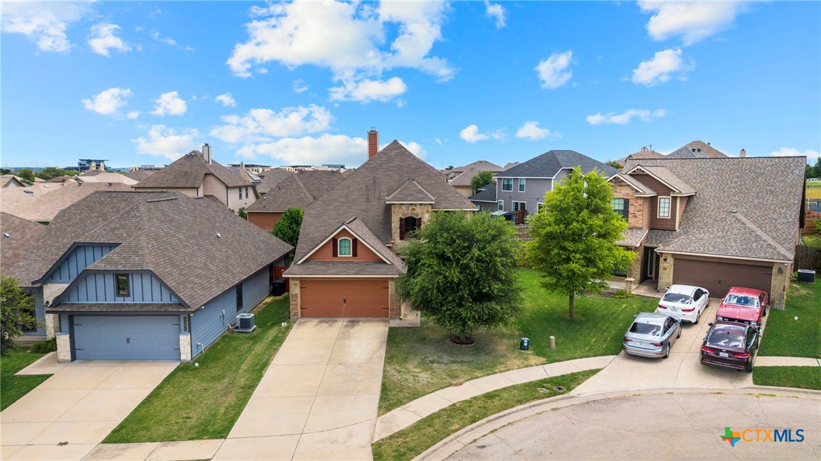 3306 Castleton Drive Killeen, TX 76542 - Photo 2 of 39 a front view of a house with a garden and plants