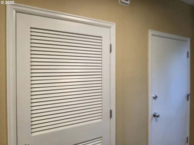 a view of a room that has a window in it