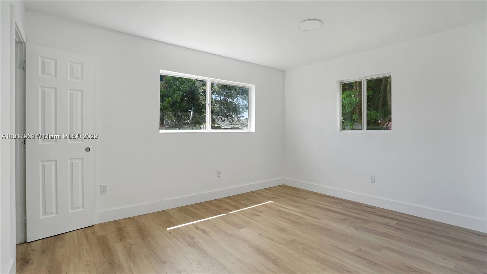 Brownsville Miami, FL 33142 - Photo 8 of 12 an empty room with a window