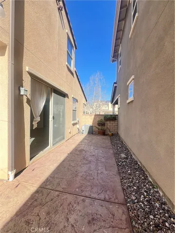 a view of a back yard of the house