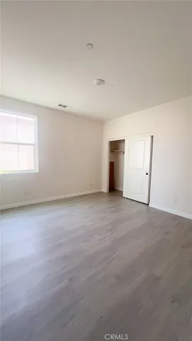 a bathroom with a double vanity sink and mirror