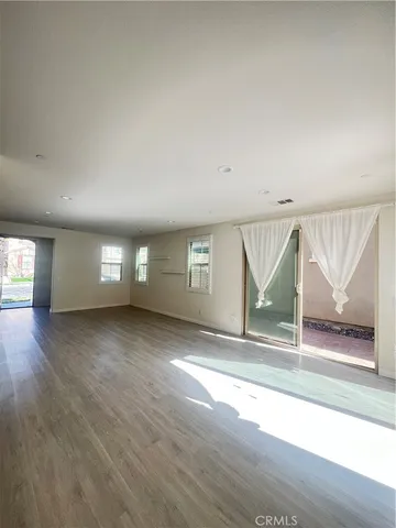 a kitchen with stainless steel appliances a refrigerator and a stove