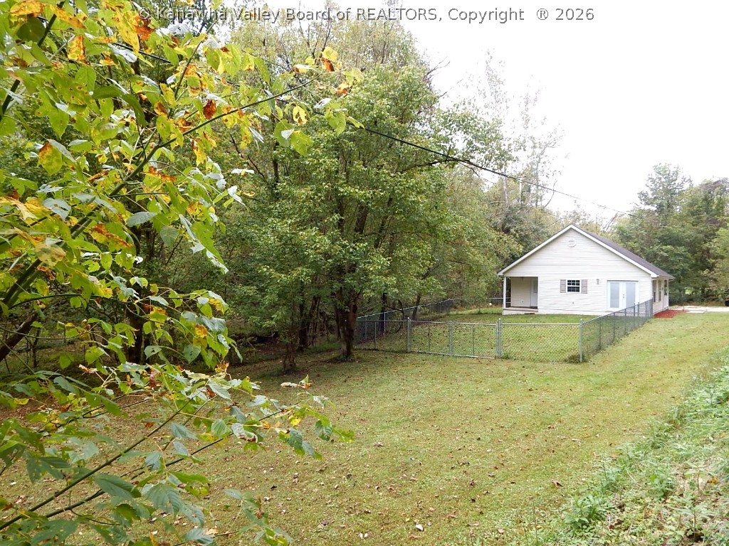 349 Bluelick Road Winfield, WV 25213 - Photo 3 of 28 ALMOST 1 ACRE OF FLAT LAND. LAND IS ALL LAND CLEARED.