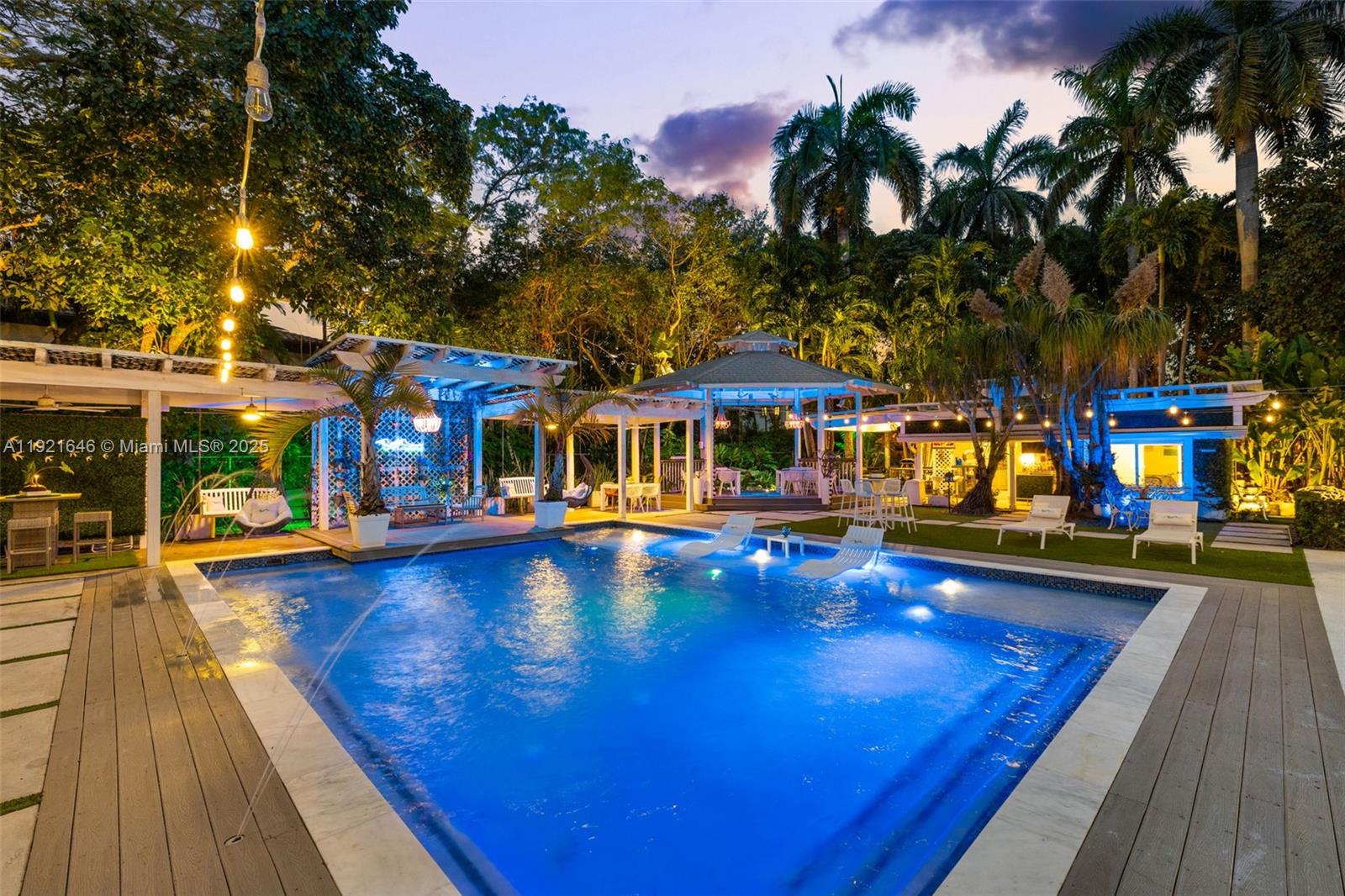 7720 Southwest 79th Court Miami, FL 33143 - Photo 13 of 58 a view of a swimming pool with a patio