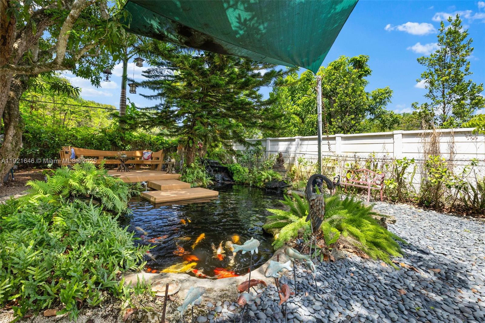 7720 Southwest 79th Court Miami, FL 33143 - Photo 18 of 58 a view of a garden