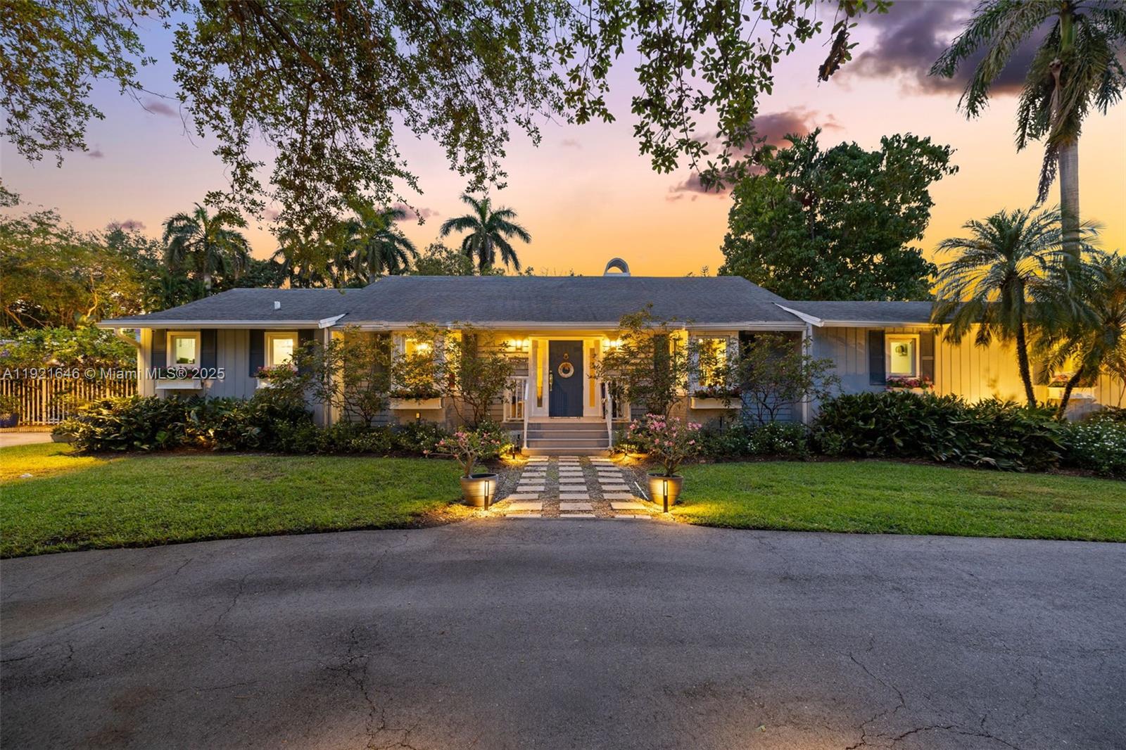 7720 Southwest 79th Court Miami, FL 33143 - Photo 2 of 58 a view of backyard with green space