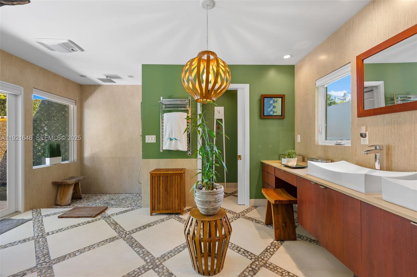 7720 Southwest 79th Court Miami, FL 33143 - Photo 32 of 58 a view of a livingroom with furniture window and wooden floor