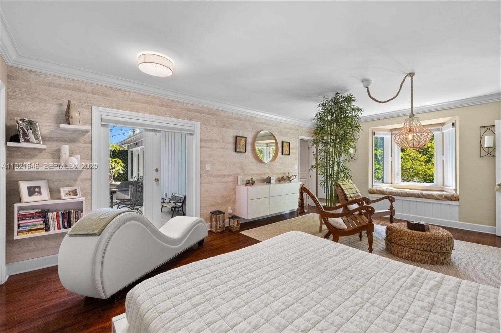 7720 Southwest 79th Court Miami, FL 33143 - Photo 34 of 58 a bedroom with furniture and a window