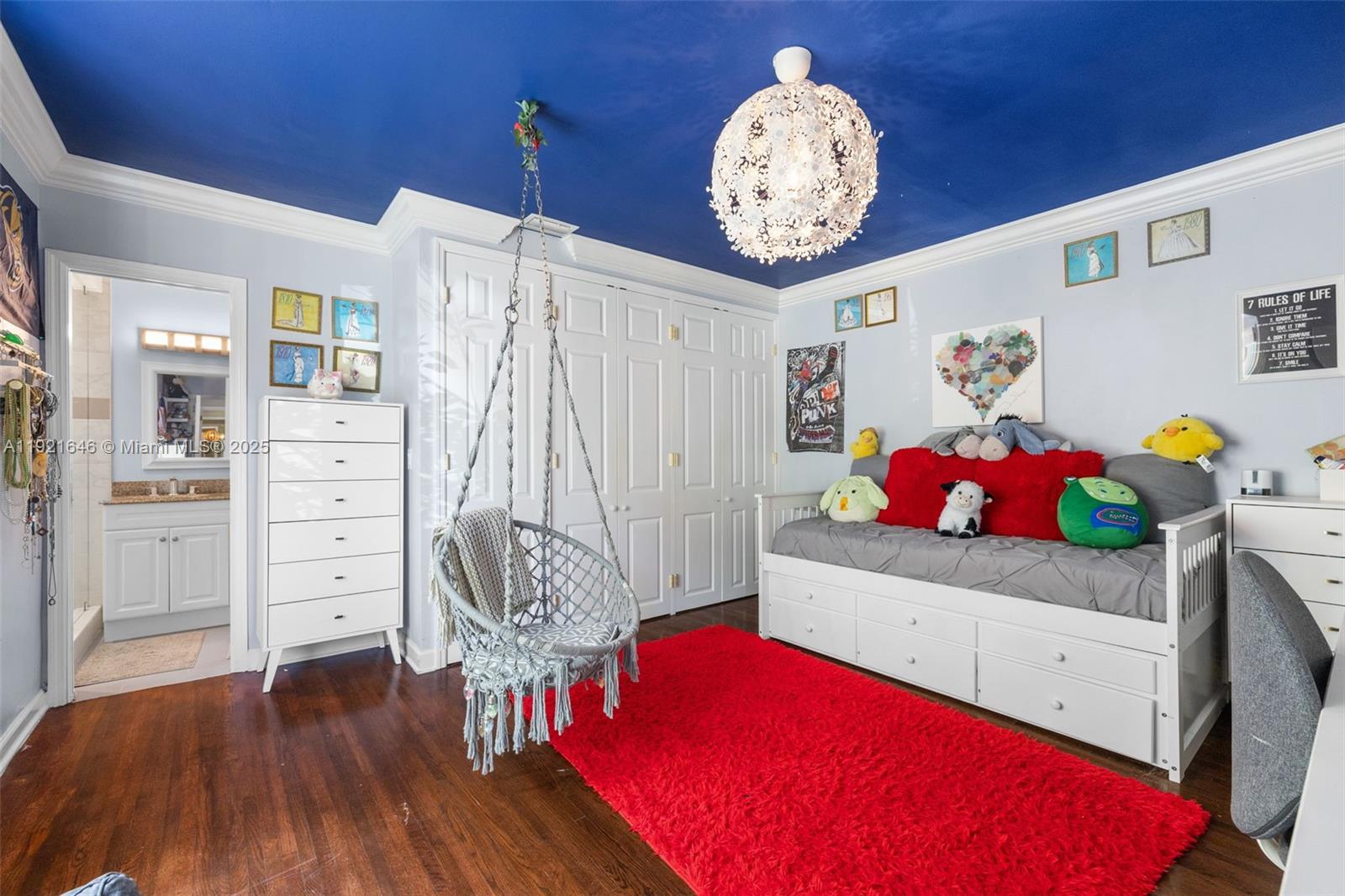 7720 Southwest 79th Court Miami, FL 33143 - Photo 36 of 58 a view of a bedroom with furniture and wooden floor