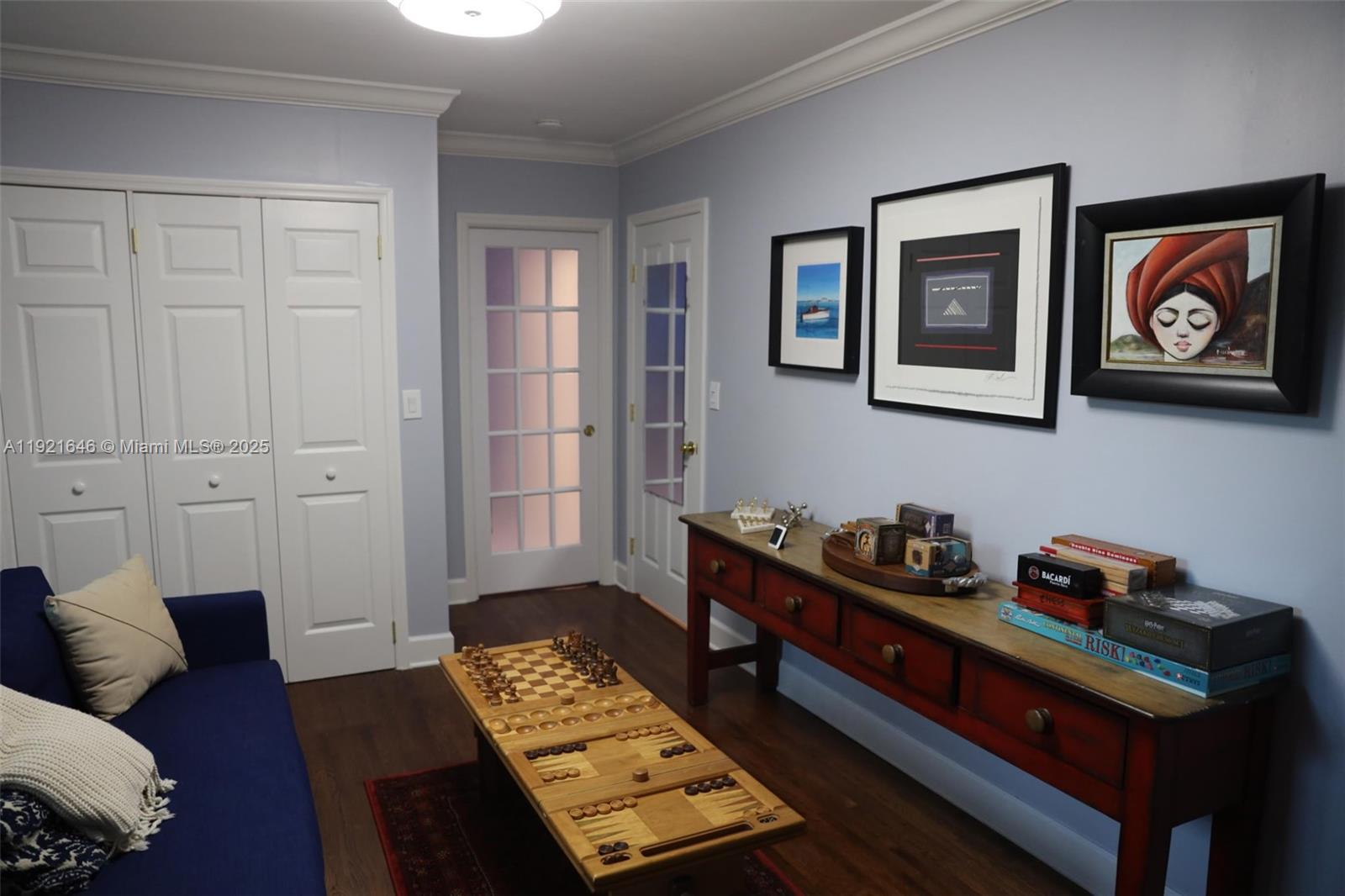 7720 Southwest 79th Court Miami, FL 33143 - Photo 38 of 58 a bedroom with furniture and a window