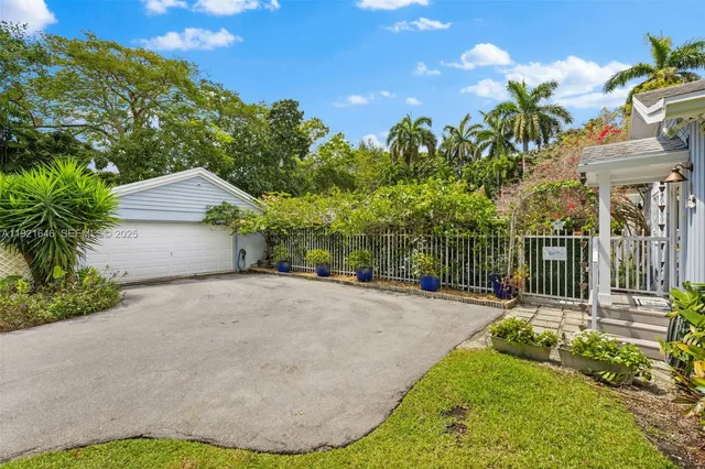 a house view with a garden space