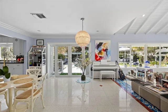 a view of a entryway with furniture and floor to ceiling window