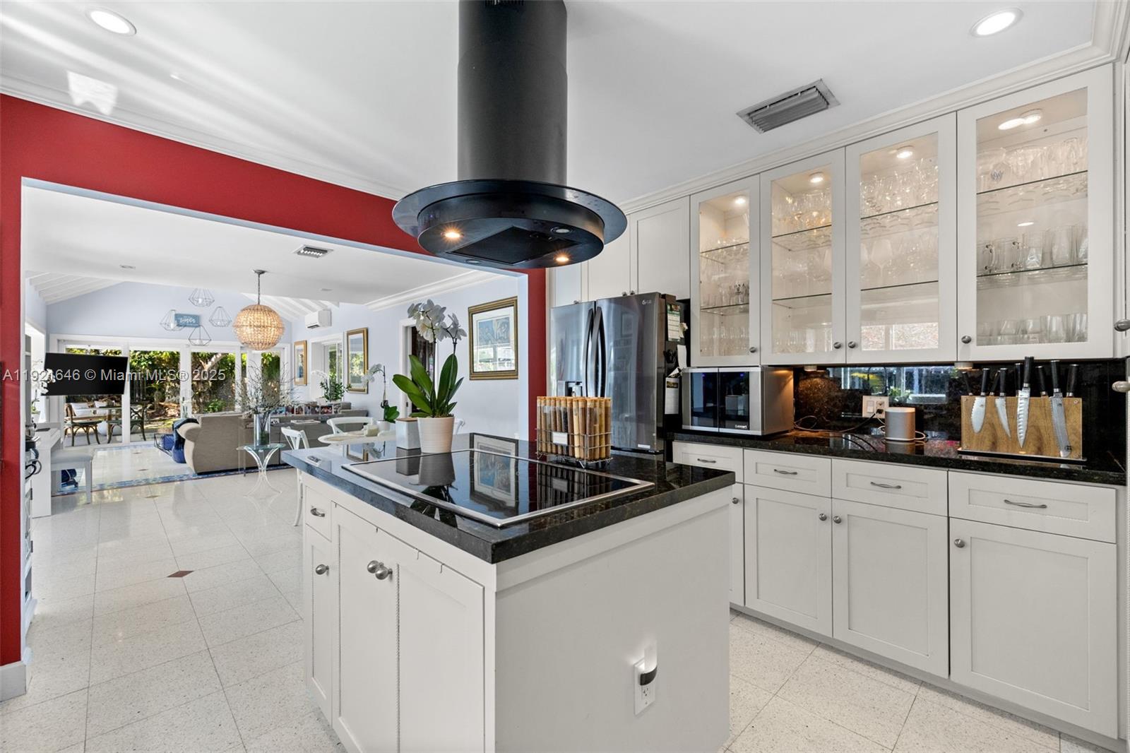 7720 Southwest 79th Court Miami, FL 33143 - Photo 46 of 58 a kitchen with stainless steel appliances granite countertop a sink and cabinets