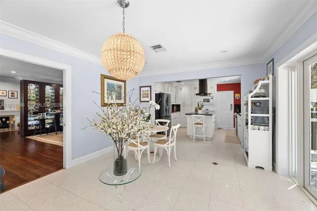 a bathroom with a sink and mirror with toilet