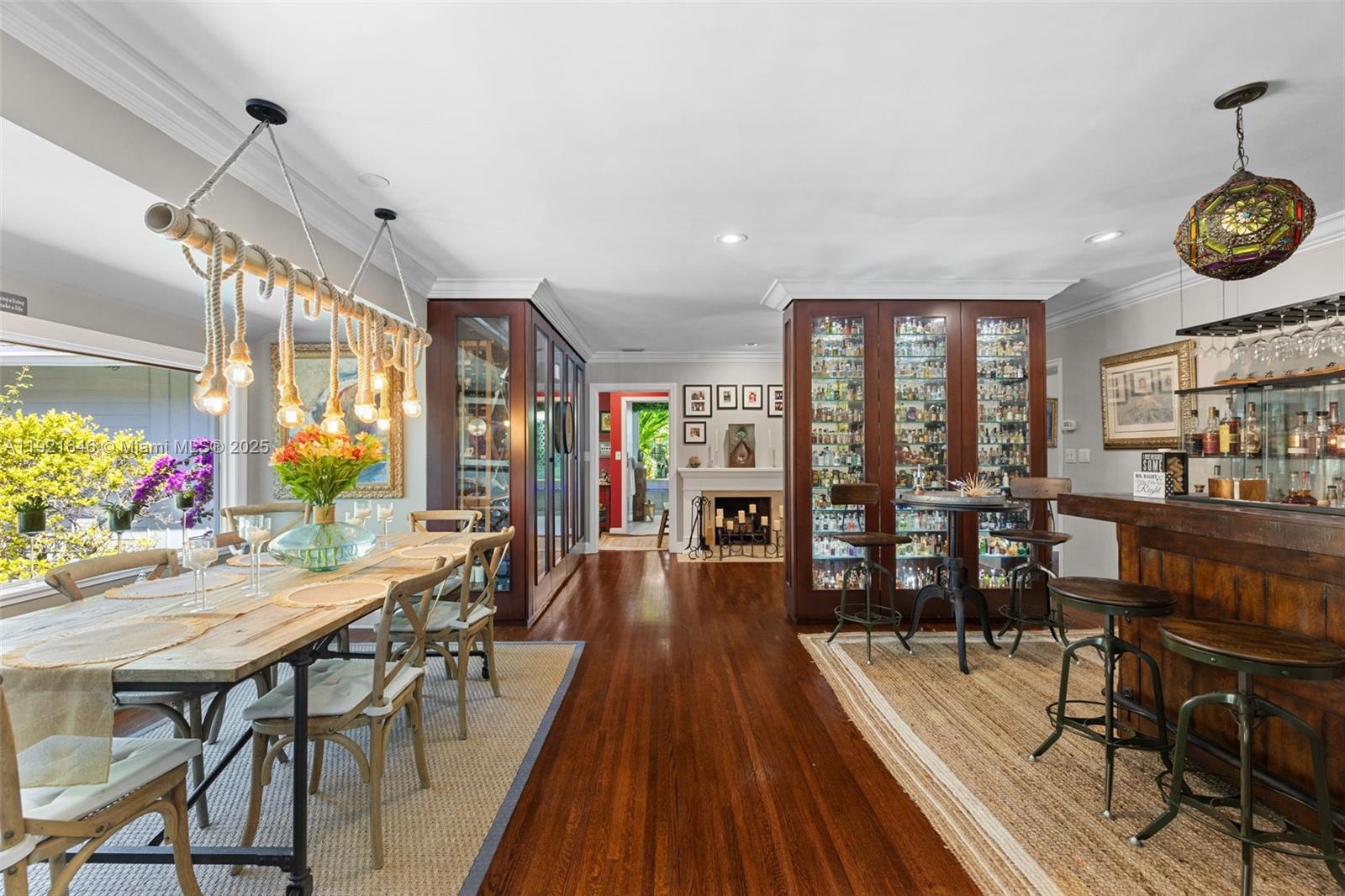 7720 Southwest 79th Court Miami, FL 33143 - Photo 50 of 58 a view of a dining room with furniture window and wooden floor