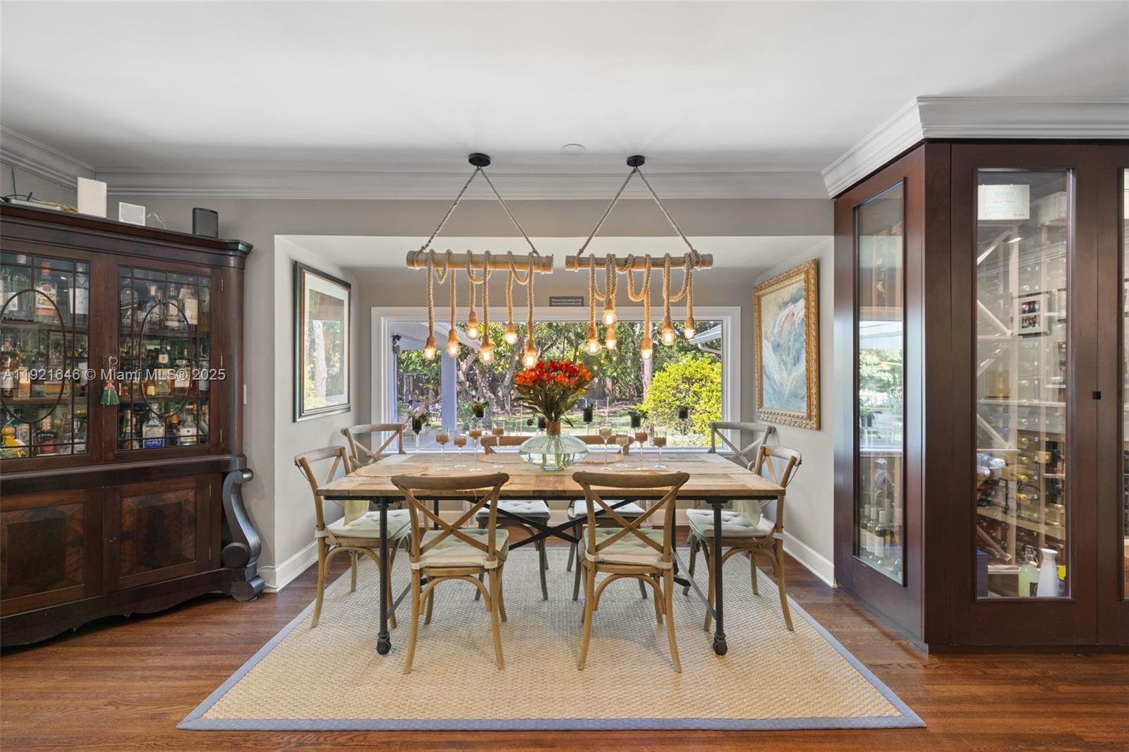 7720 Southwest 79th Court Miami, FL 33143 - Photo 52 of 58 a view of a dining room with furniture window and wooden floor