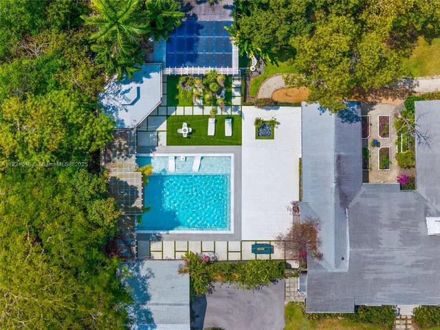 a view of a patio with swimming pool
