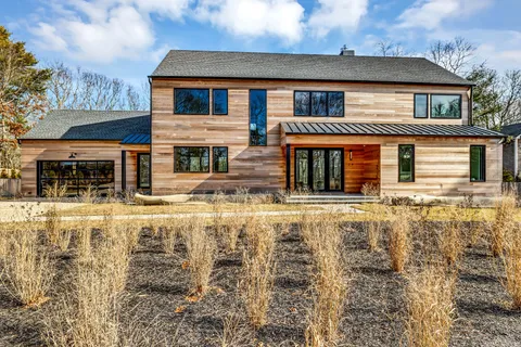 front view of a house with a yard