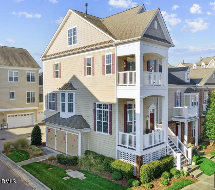 10510 Sablewood Drive, Unit 116 Raleigh, NC 27617 - Photo 1 of 47 a front view of a house with a yard