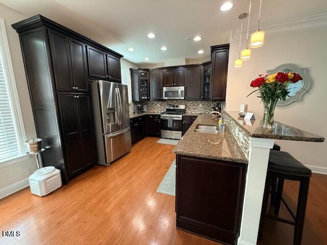 10510 Sablewood Drive, Unit 116 Raleigh, NC 27617 - Photo 15 of 47 a kitchen with refrigerator and window