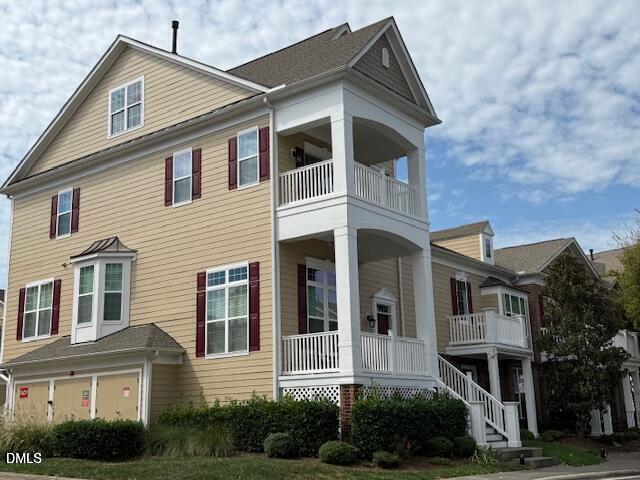 10510 Sablewood Drive, Unit 116 Raleigh, NC 27617 - Photo 2 of 47 a front view of a house with garden