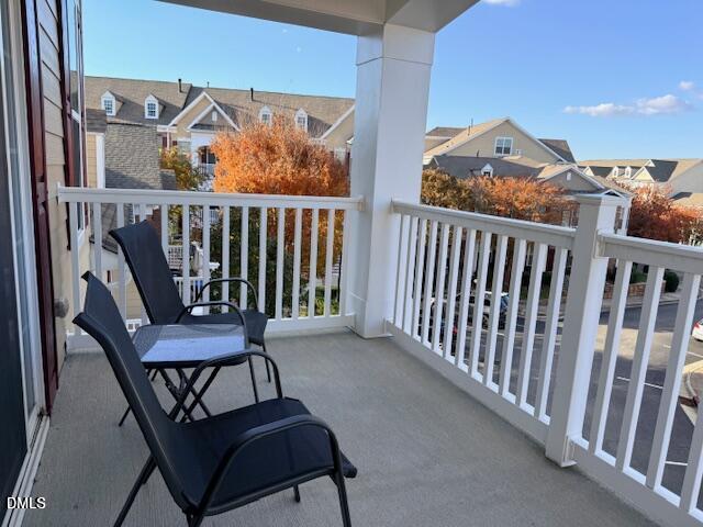 10510 Sablewood Drive, Unit 116 Raleigh, NC 27617 - Photo 23 of 47 a view of a chair in wooden floor